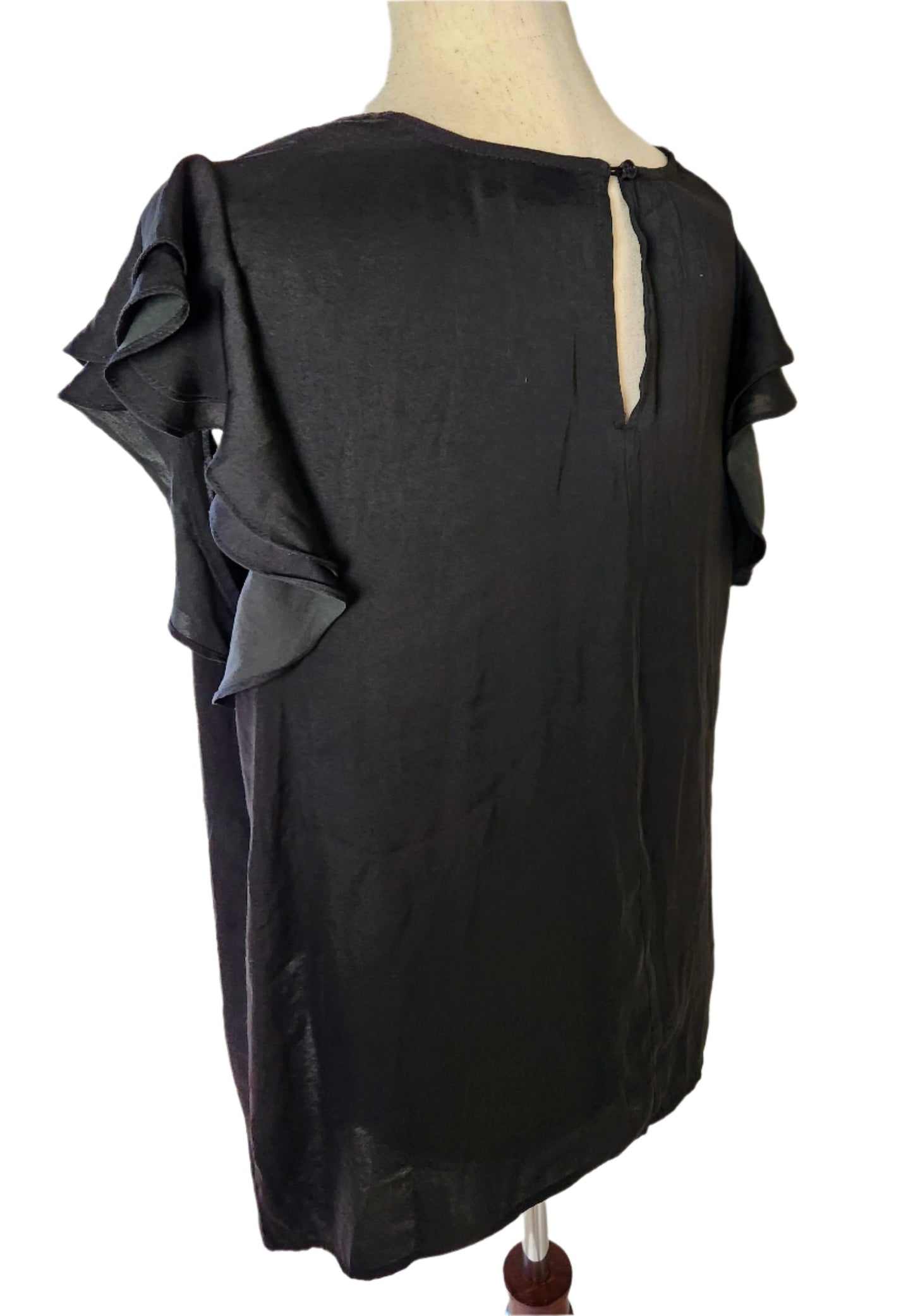 black blouse with short ruffle sleeve